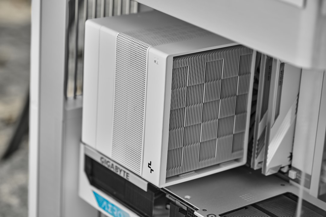 a-white-computer-case-with-a-checkered-front-panel-o8b59akqy9e